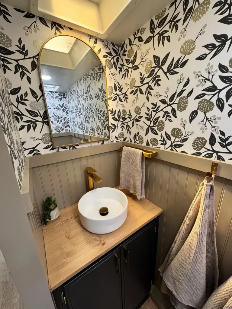 Bold Wallpaper Print With a Painted Wainscoting to Balance Pattern
