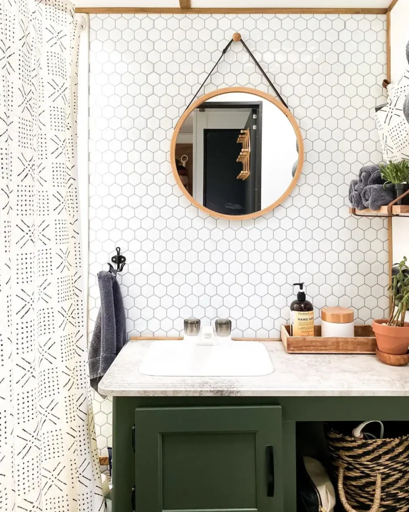 Round Mirror on a Leather Strap Instead of Mounting One Flush to the Wall